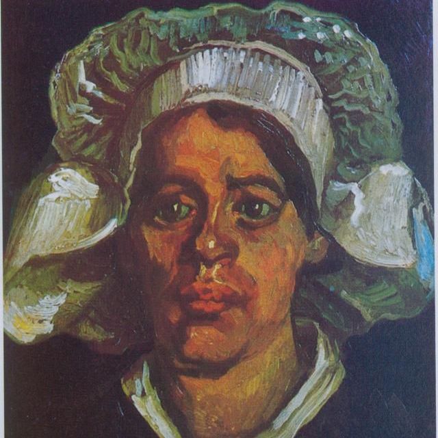 戴白帽子的农妇-梵高油画作品